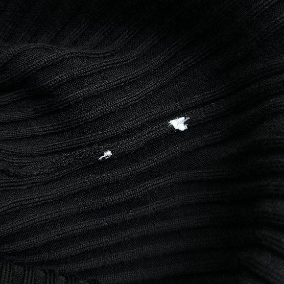 Alaia long sleeve wool blend ribbed knit bodysuit in black - Picture 11 of 12